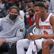 New Knick Cam Reddish sits on bench after trade to New York with Duke buddy R.J. Barrett.